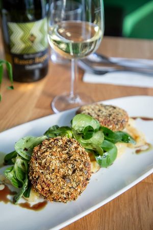 Blunznradln with potato and coleslaw  at Velani in Vienna