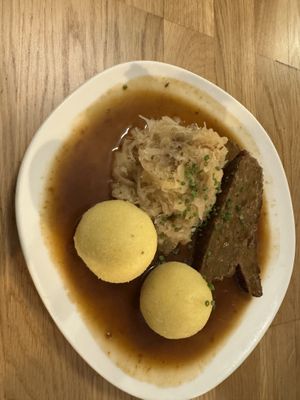 Kümmelbraten mit Süßkraut und Erdäpfelknödel  at Velani in Vienna