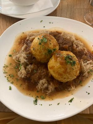Greave dumplings (grammelknödel mit sauerkraut) at Velani in Vienna