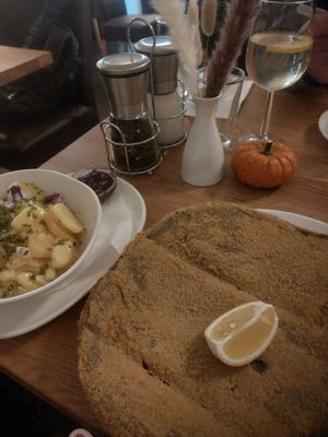 Potato salad, Wiener Schnitzel and jam at Velani in Vienna