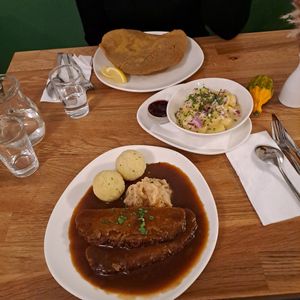 Kümmelbraten mit Sauerkraut and schnitzel and Potatoe salad at Velani in Vienna