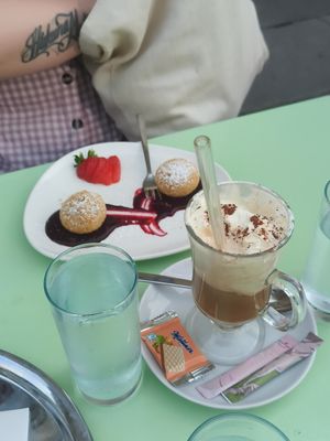 Nougat dumplings with berry coulis & icecoffee (icecream coffee) at Velani in Vienna