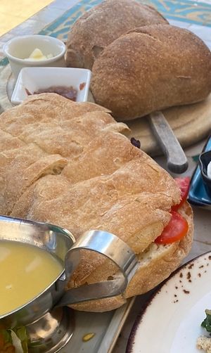 Artichoke sandwich and bread with spreads  at Yodfat Cafe in Yodfat