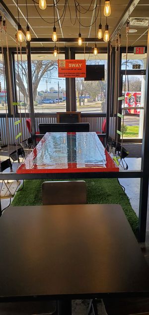 Swings at Tongue In Cheek Ice Cream in Richardson