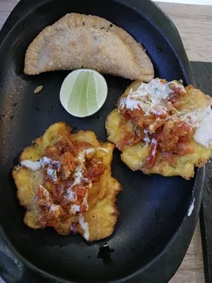 Pascobas and empanadas.  You get 4 of each but we ate them before the photo. at Maha Vegan Food in Bogota