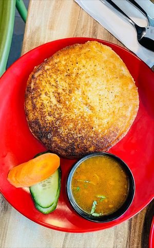 Lentil Pancake savoury with the special vegan sauce at Momo Central in Melbourne