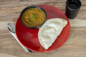 deep fried bread with pea curry at Momo Central in Melbourne