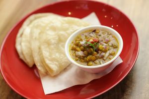 Vegan Deep Fried Bread with Aromatic Pea Curry at Momo Central in Melbourne