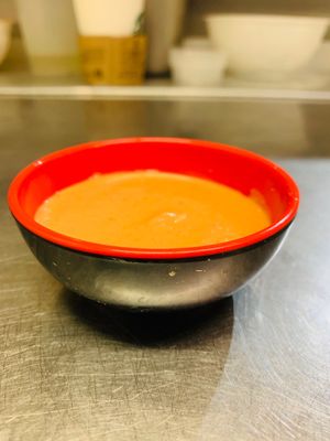 tomato, Szechuan pepper,white sesame vegan Chutney. at Momo Central in Melbourne