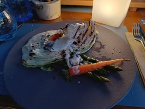 Cabbage steak with mushroom sauce, asparagus and carrots at Oniro By The Sea in Paphos