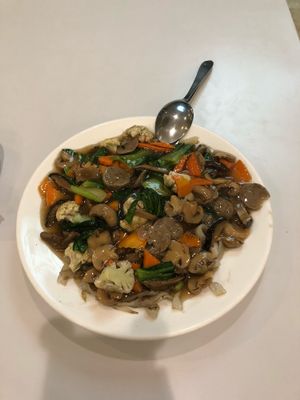 Fried noodles with mushrooms and cauliflower  at Loving Hut in Surabaya