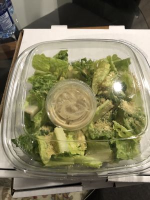 Caesar salad, the container wasn't even half full 😕 at Pizzeria Du in Toronto