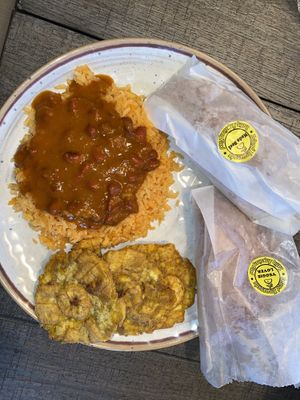 Rice, beans, tostones, veggie lover empanada and Nada Beef empanada  at Island Empanada in Lake Ronkonkoma