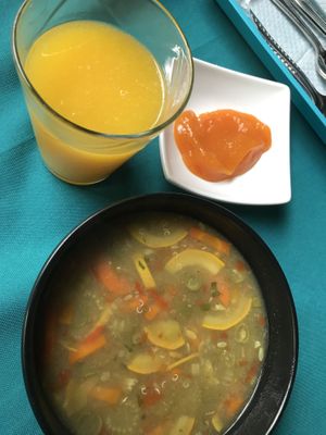 Juice, desert and soup that comes with a meal of the day at Govindas in Manizales