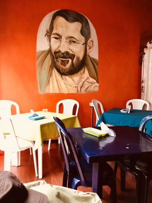 Interior and a seating section  at Govindas in Manizales