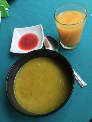 Soup, juice and a small desert that come with the meal of the day   at Govindas in Manizales