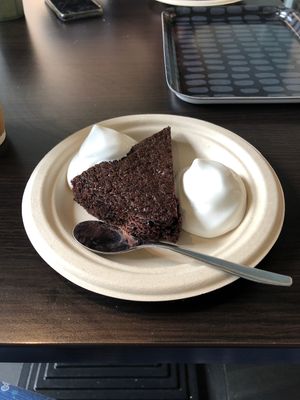 Chocolate cake with whipped vegan cream at Station Grön in Raettvik