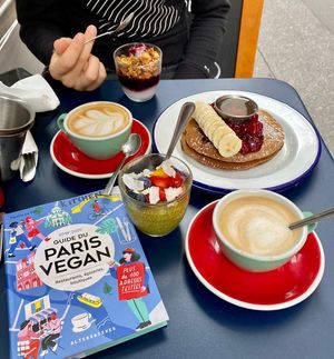 Vegan pancakes, chia pudding, granola yogurt and lattes. at Kitchen Paris in Paris
