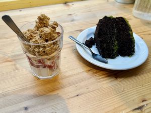 Granola with coconut yogurt and chocolate-matcha cake   at Kitchen Paris in Paris