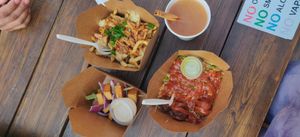 BBQ poutine, tofu kebab, Machurani balls with fried rice and hot sauce(0.50cent extra), hot apple cider at Sweet Po Vegan Eats in Toronto