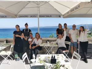 BioMania team on the Bistro terrace at BioMania Bistro Bol in Bol