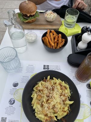 Carbonara Pasta and vegan Burger - it was delicious and you have a good view of the sea  at BioMania Bistro Bol in Bol