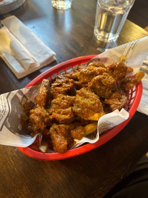 Currywurst - Fries & Beyond sausage with a ketchup curry sauce on top (Can get mild, medium, hot) at Shepherd's Pub in Elora