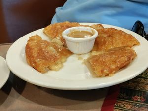 Roti stuffed with banana served with caramel sauce at Aroy Thai Gardens in Middletown