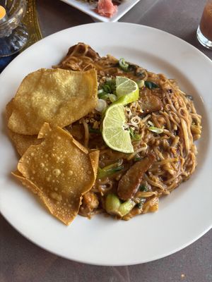 Tom yum noodles with rice noodles, no soup and added chicken  at Aroy Thai Gardens in Middletown