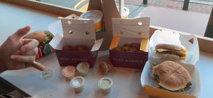 Bloomies, fries, egg Sammy, chicken fungi, spicy chicken fungi, chocolate milkshake at PLNT Burger in Wynnewood