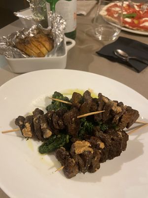 Vegan soy skewers + hassleback potato   at 53040 Ristorante Pizzeria in Cetona