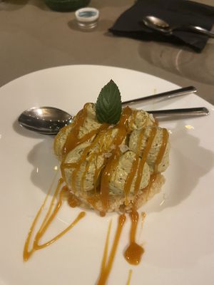 Deliciously amazing - almond sponge, pistachio ganache, and salted caramel   at 53040 Ristorante Pizzeria in Cetona