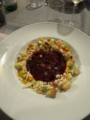 Carpaccio di barbabietola con dadolata di pesche, sedano e altre verdure e fresche e croccanti!  at 53040 Ristorante Pizzeria in Cetona