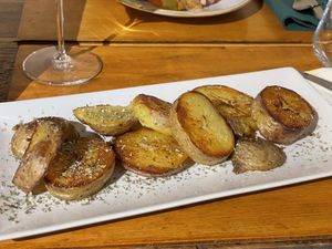 Patate al forno con spezie at Osteria delle Crete in San Giovanni Dasso