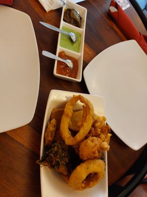 Vegetable pakora with dipping sauce, the middle green one is NOT vegan! at Namaste in Ljubljana