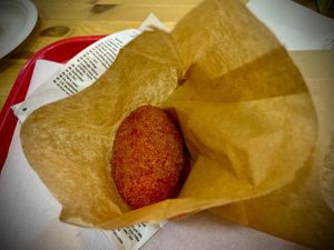 Vegan supplì, delicious, we had the classic ones (with tomato sauce and vegan mozzarella) and the parmigiana (with tomato sauce and aubergines) at iVegan in Rome