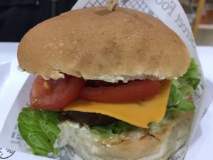 Smoked vegan burger with vegan paprika cheese, fresh onion, lettuce, tomatoes, vegan mayo  at iVegan in Rome