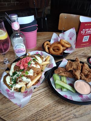 Katsu chicken loaded fries, onion rings and chicken wings at Freeloada  in Brighton