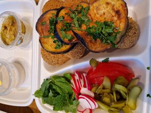 Falafel dinner with hummus and tahini. Pickles, tomato, radish, mint and aubergine. at King Falafel in Oslo