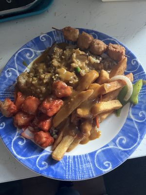 Chicken fried rice, sweet and sour chicken, salt and pepper chips & curry sauce    at Wawin Vegan Chinese in Leeds