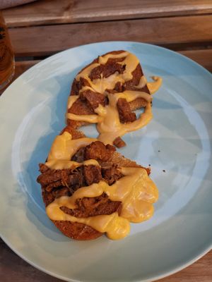 Topinka witch fake meat and vegan cheese sauce at Shromaždiště in Prague