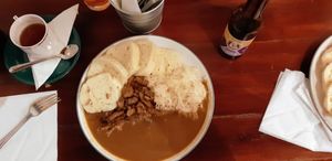 Výpečky - vegan soy "meat" pieces with gravy, sauerkraut, and knedliki. Delish! at Shromaždiště in Prague