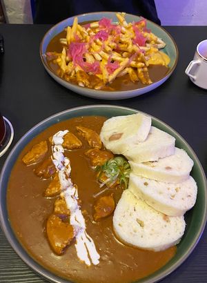 The spicy cheezy fries and kukuře na paprice are amazing  at Shromaždiště in Prague