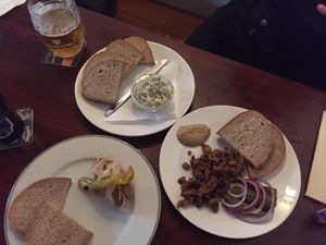 No fish spread, pickled sausage, and “meat pieces with bread, mustard and onion.  at Shromaždiště in Prague