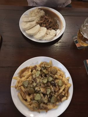 poutine like and soy chunks with cabbage and dumplings at Shromaždiště in Prague
