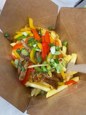 Sweet chilli seitan and fries at Nature's Street Chef in Crewe