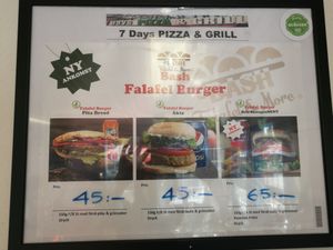 The two first burgers in the picture are vegan, the third one contains cheese but you can request without it. at 7 Days Pizza & Grill in Malmo