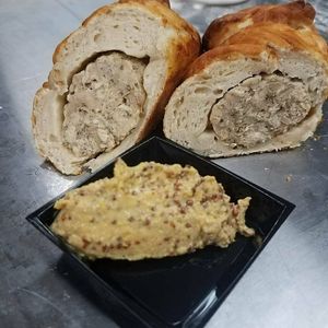 Pretzel wrapped chicken sausages dipped in stone ground mustard. These were Yumazing! at Peace Love Coffee in St Charles