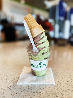 Chocolate and matcha vegan soft serve swirl with cake cone. 100% vegan.   at Matcha-Ya in Kapaa