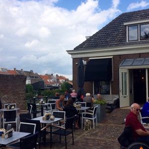 Outdoor seating and front at Aan de Gracht in Elburg